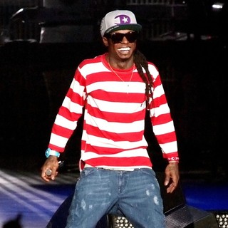 Lil Wayne in Lil Wayne Performs on Stage During The I Am Music Tour