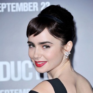 Lily Collins in The Premiere of Abduction - Arrivals