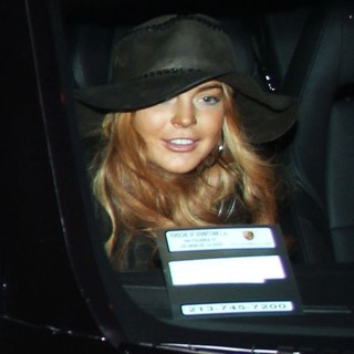 Lindsay Lohan in Lindsay Lohan Arrives Into LAX