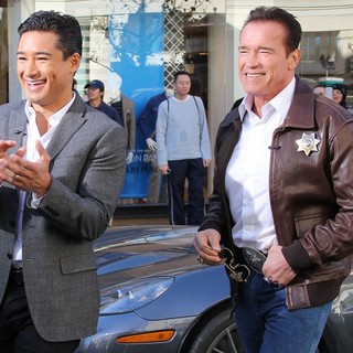 Mario Lopez, Arnold Schwarzenegger in Arnold Schwarzenegger Drives A Sheriff Truck to The Grove to Promote Film The Last Stand on Extra