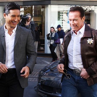 Mario Lopez, Arnold Schwarzenegger in Arnold Schwarzenegger Drives A Sheriff Truck to The Grove to Promote Film The Last Stand on Extra