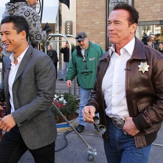 Mario Lopez, Arnold Schwarzenegger in Arnold Schwarzenegger Drives A Sheriff Truck to The Grove to Promote Film The Last Stand on Extra