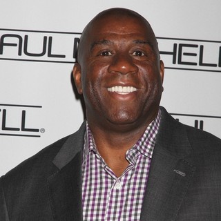 Magic Johnson in The 27th Annual Paul Mitchell Hair School Caper Event