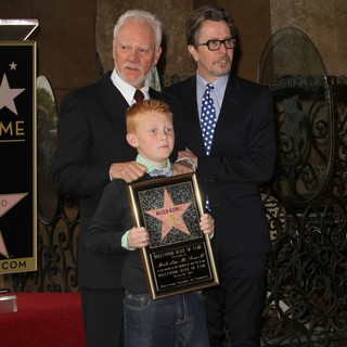 Malcolm McDowell, Beckett Taylor McDowell, Gary Oldman in The Hollywood Walk of Fame Honors Malcolm McDowell