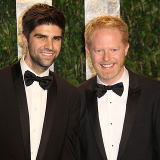 Justin Mikita, Jesse Tyler Ferguson in 2012 Vanity Fair Oscar Party - Arrivals