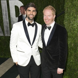Justin Mikita, Jesse Tyler Ferguson in 2013 Vanity Fair Oscar Party - Arrivals