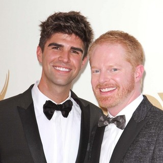 Justin Mikita, Jesse Tyler Ferguson in The 63rd Primetime Emmy Awards - Arrivals