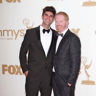 Justin Mikita, Jesse Tyler Ferguson in The 63rd Primetime Emmy Awards - Arrivals