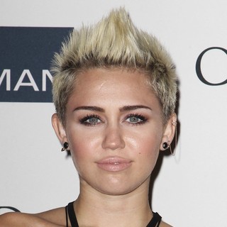 Miley Cyrus in Clive Davis and The Recording Academy's 2013 Pre-Grammy Gala and Salute to Industry Icons