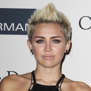 Miley Cyrus in Clive Davis and The Recording Academy's 2013 Pre-Grammy Gala and Salute to Industry Icons