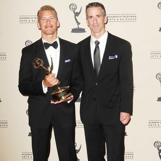 Terry Miller, Dan Savage in 2012 Creative Arts Emmy Awards - Press Room