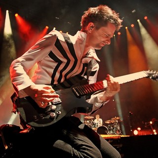 Matthew Bellamy, Dominic Howard, Muse in Muse Performing Live in Concert
