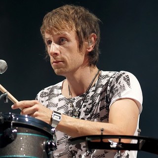 Dominic Howard, Muse in Muse Performing Live in Concert