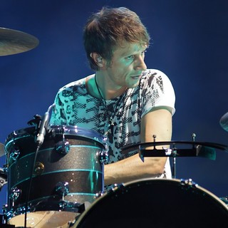 Dominic Howard, Muse in Muse Performing Live in Concert