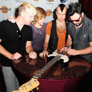 Neon Trees Donate Sign Bass Guitar Memorabilia to Hard Rock Hotel