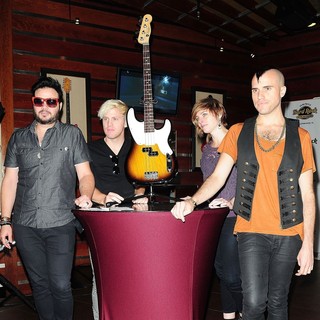 Neon Trees Donate Sign Bass Guitar Memorabilia to Hard Rock Hotel