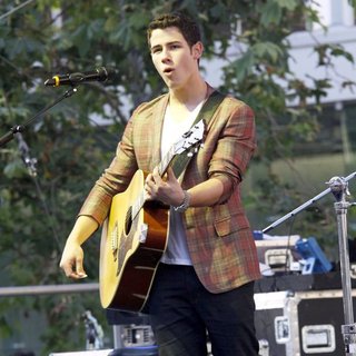 Nick Jonas Performs An Acoustic Set at A Concert Sponsored by Microsoft
