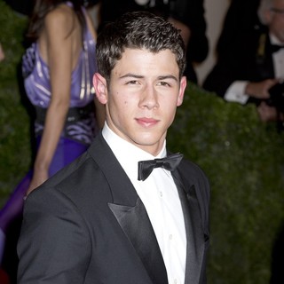 Nick Jonas, Jonas Brothers in Schiaparelli and Prada Impossible Conversations Costume Institute Gala