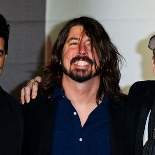 Pat Smear, Dave Grohl, Rick Nielsen in The 2013 Brit Awards - Arrivals