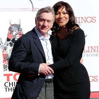 Robert De Niro, Grace Hightower in Robert De Niro Places His Hand and Foot Prints in Cement During The Footprint Ceremony