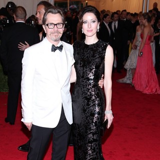 Gary Oldman, Alexandra Edenborough in Schiaparelli and Prada Impossible Conversations Costume Institute Gala