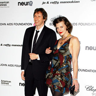Milla Jovovich, Paul W.S. Anderson in 18th Annual Elton John AIDS Foundation Academy Awards (Oscars) Viewing Party - Arrivals