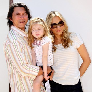 Lou Diamond Phillips, Yvonne Boismier in Winnie the Pooh Premiere