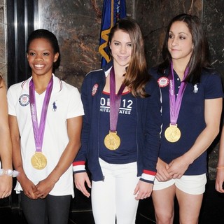Aly Raisman, Gabrielle Douglas, McKayla Maroney, Jordyn Wieber, Kyla Ross in US Women's Gymnastics Team Attending A Lighting Ceremony