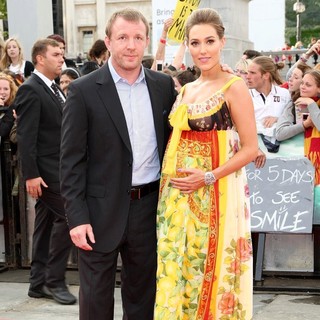 Guy Ritchie, Jacqui Ainsley in Harry Potter and the Deathly Hallows Part II World Film Premiere - Arrivals