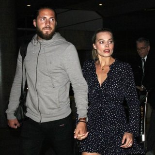 Tom Ackerley, Margot Robbie-Margot Robbie and Tom Ackerley at Los Angeles International Airport