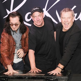 Rush in Rush Honored on Guitar Center's RockWalk