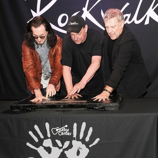 Rush in Rush Honored on Guitar Center's RockWalk