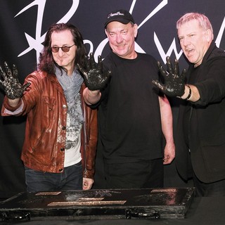 Rush in Rush Honored on Guitar Center's RockWalk