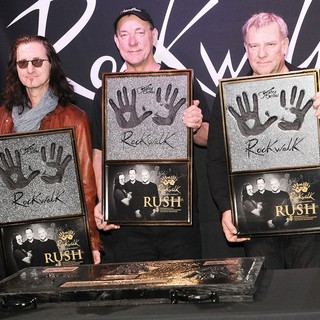 Rush in Rush Honored on Guitar Center's RockWalk