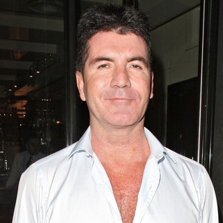 Simon Cowell Leaving C London Restaurant After Dining Together with Friends