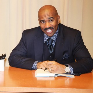 Steve Harvey in Steve Harvey Signs Copies of His New Book Straight Talk, No Chaser
