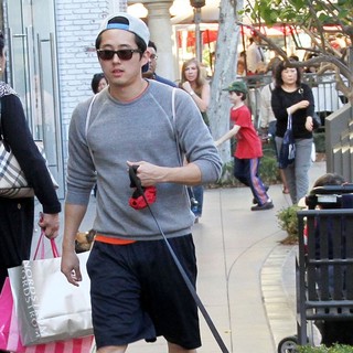 Steven Yeun in Steven Yeun Walks His Dog Through The Grove