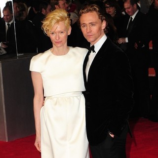 Tilda Swinton, Tom Hiddleston in Orange British Academy Film Awards 2012 - Arrivals