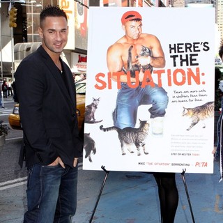 The Situation in The Situation Attends A Photocall in Times Square for PETA's Ad Campaign