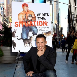 The Situation in The Situation Attends A Photocall in Times Square for PETA's Ad Campaign
