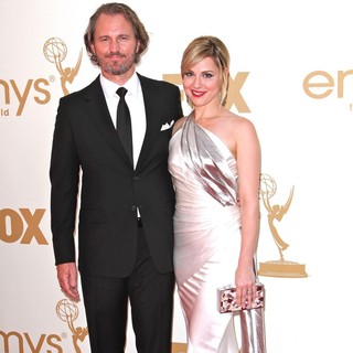 Peter Thum, Cara Buono in The 63rd Primetime Emmy Awards - Arrivals