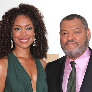 Gina Torres, Laurence Fishburne in The 63rd Primetime Emmy Awards - Arrivals