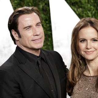 John Travolta, Kelly Preston in 2013 Vanity Fair Oscar Party - Arrivals