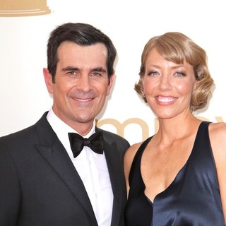 Ty Burrell, Holly Burrell in The 63rd Primetime Emmy Awards - Arrivals