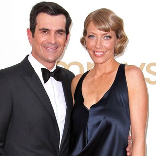 Ty Burrell, Holly Burrell in The 63rd Primetime Emmy Awards - Arrivals