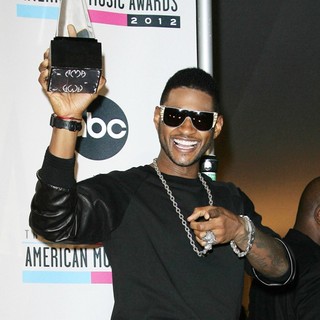 Usher in The 40th Anniversary American Music Awards - Press Room