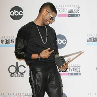 Usher in The 40th Anniversary American Music Awards - Press Room