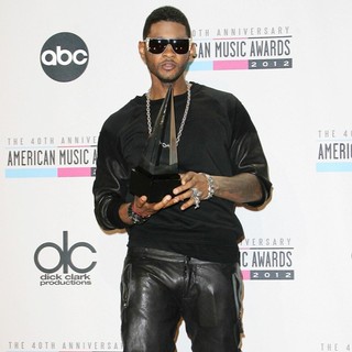 Usher in The 40th Anniversary American Music Awards - Press Room