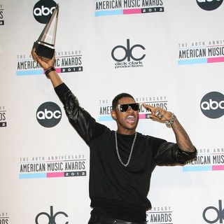 Usher in The 40th Anniversary American Music Awards - Press Room