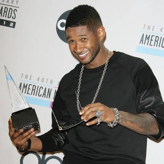 Usher in The 40th Anniversary American Music Awards - Press Room